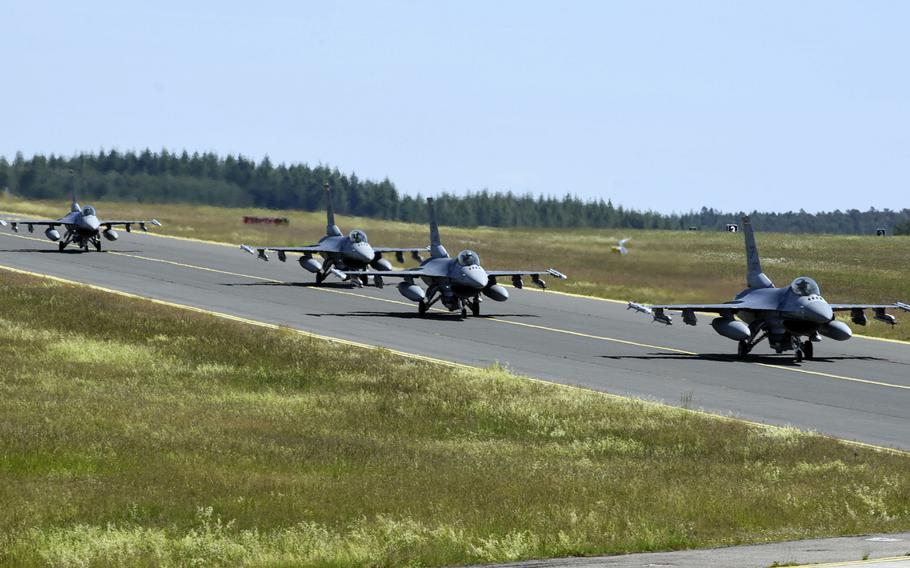 U.S. Air Force F-16 Fighting Falcons, assigned to the 480th Fighter Squadron, taxi at Spangdahlem Air Base, Germany, in May 2020. USAFE-AFAFRICA commander Gen. Jeffrey Harrigian said Monday, Sept. 14, 2020, that moving Spangdahlem's 480th Fighter Squadron from Germany to Aviano Air Base, Italy, could take some time.