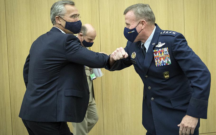 NATO Secretary-General Jens Stoltenberg and General Tod D. Wolters, Supreme Allied Commander Europe, greet each other at NATO Headquarters in Brussels, Belgium, Oct. 22, 2020.