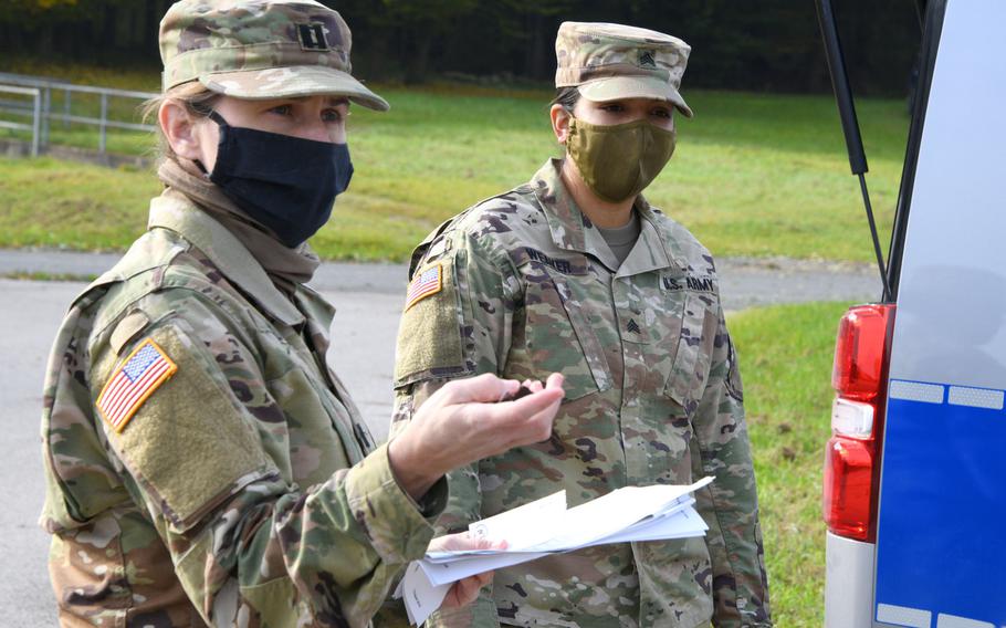 Cpt. Anna Schultz, left, and Sgt. Toni Weaver, both with the Vilseck Veterinary Treatment Facility, give instructions during an exercise in Vilseck, Germany, Oct. 20, 2020. The 7th Army Training Command announced new coronavirus travel restrictions for soldiers in the Bavaria footprint, including Vilseck, as the virus resurges across Europe.