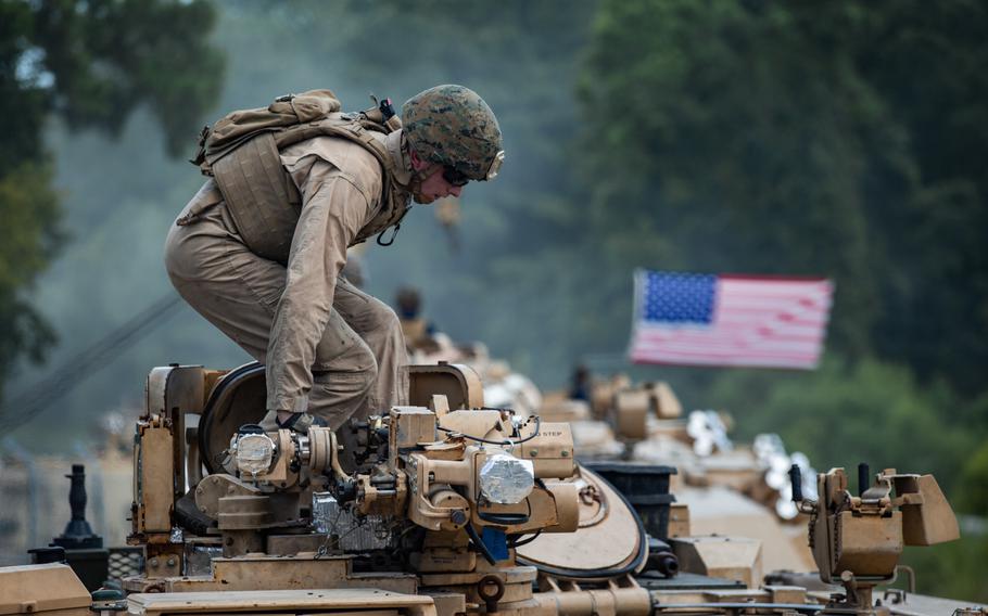A Marine with 2nd Tank Battalion, 2nd Marine Division, prepares to depart from a tank lot on Camp Lejeune, N.C., July 27, 2020.