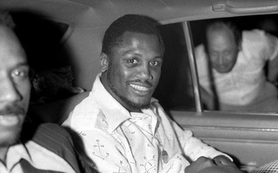 Heavyweight boxing champion Joe Frazier arrives in Frankfurt to begin a tour of Europe with his blues-rock group, The Knockouts.