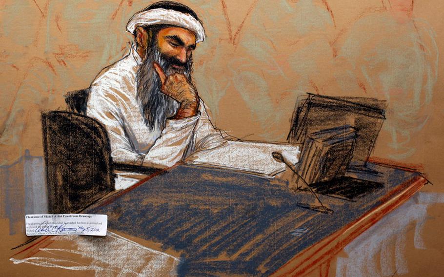Accused 9/11 mastermind Khalid Sheikh Mohammed appears in this courtroom sketch at his military commission hearing in Guantanamo Bay, Cuba, on Saturday, May 5, 2012.