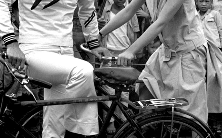 Co-stars Steve McQueen and Candice Bergen during filming of "The Sand Pebbles" on Taiwan in 1965.