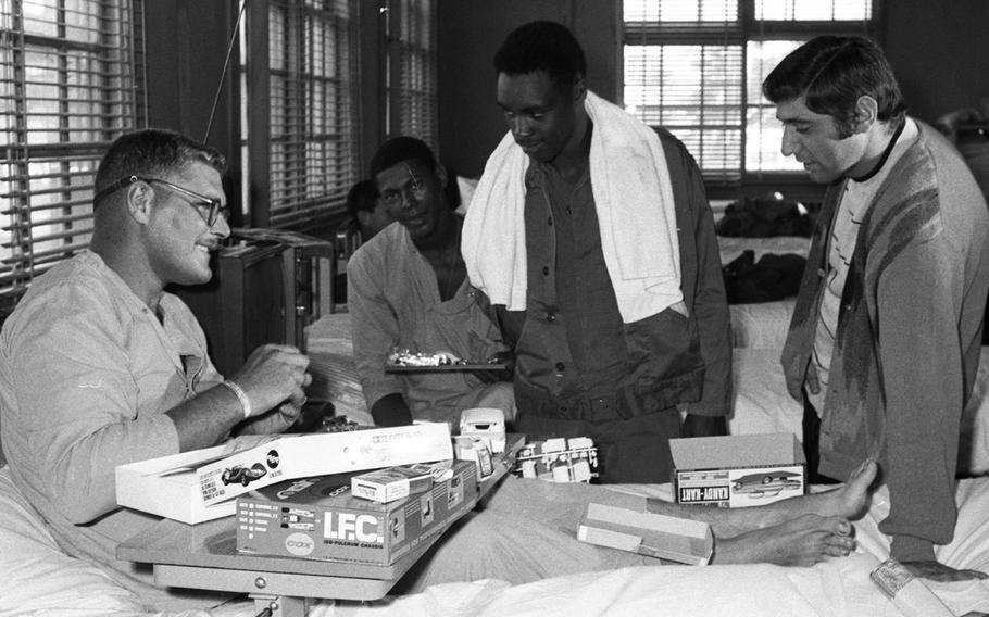 NFL players visit the troops at the U.S. Army Hospital on Camp Oji, Japan, in January, 1969.