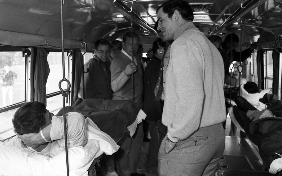 Steve Wright of the New York Giants talks with troops at the U.S. Army Hospital on Camp Oji, Japan, in January, 1969.