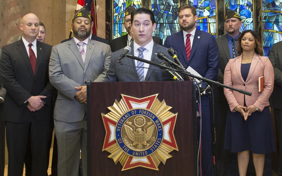 Andrew Brennan, former Army captain and founder and executive director of the Global War on Terror Memorial, speaks during a press conference, March 28, 2017.