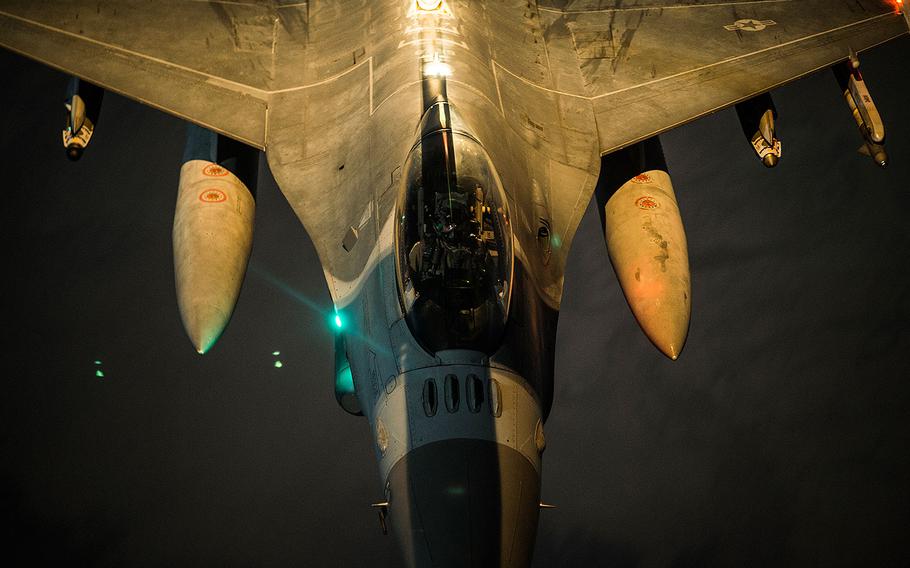 A U.S. Air Force F-16C Fighting Falcon performs refueling operations with a KC-10 Extender while conducting air patrols and possible air strikes in Iraqi and Syrian airspace in support of Operation Inherent Resolve, Dec. 02, 2017. 