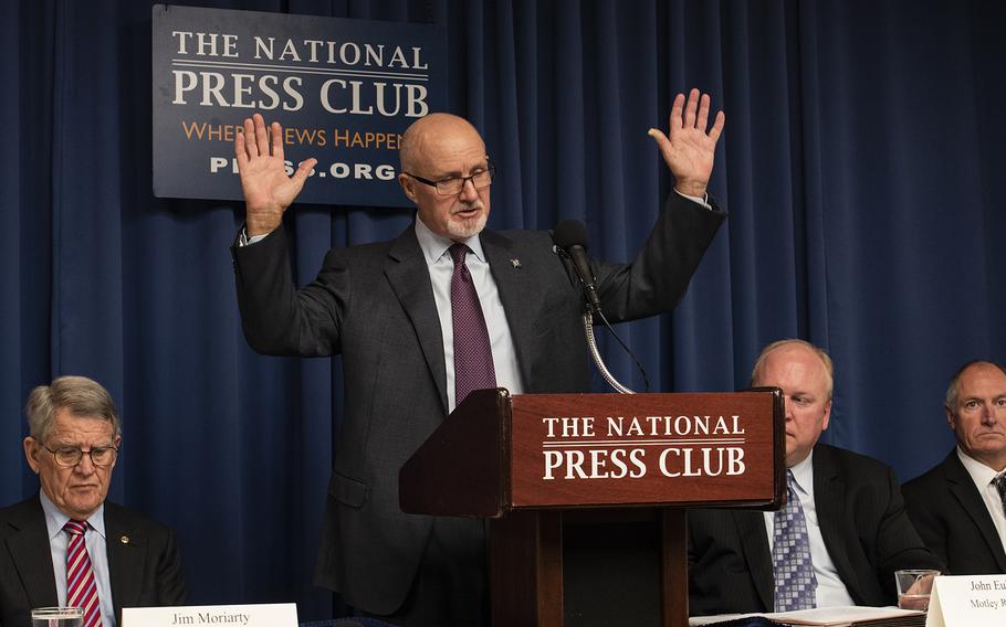 Brian McEnroe, the father of slain Green Beret Staff Sgt. Kevin McEnroe, on Friday, Nov. 16, 2018 shows how his son placed his hands up as a Jordanian soldier attacked him in November of 2016. Staff Sgt. McEnroe and two other Special Forces soldiers were killed in the attack. The families of the soldiers on Frida filed a lawsuit against the Kingdom of Jordan seeking damages for the wrongful deaths of their sons and attempting to cover up the incident.