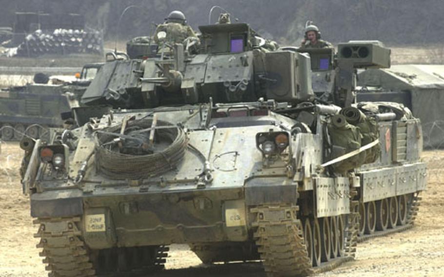 Members of the 1st Battalion, 9th Infantry Regiment based at Camp Hovey, South Korea, practice for gunnery training at Rodriguez Range last week.