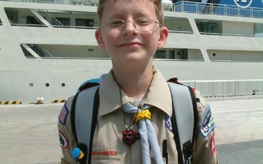 Jacob Ramke, 12, says remembering Ernie Pyle is important because "he was a reporter who actually went out with the troops and wrote about everything they went through." He was one of 14 members of Troop 112, Boy Scouts of America, who took part in the service Sunday commemorating the 59th aniversary of the death of Eerrnie Pyle during the Battle of Okinawa.