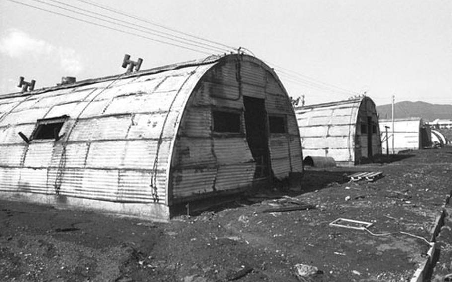 Three of the 15 Quonset huts destroyed in the 1979 fire at Camp Fuji when a fuel storage bladder burst during a typhoon, sending 5,000 gallons of gasoline cascading into the camp.