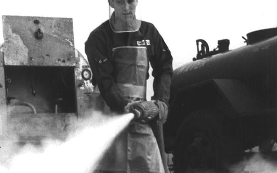 1963: Airman James Thompson, assigned to the liquid oxygen plant at Bentwaters Air Base, England, gives a LOX servicing cart its quarterly purge, a practice that ensures the liquid oxygen is pure and safe for use.