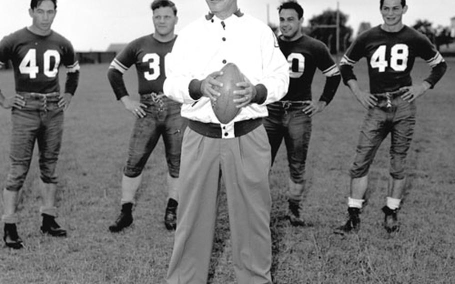 Benny Friedman conducts a football clinic at Aschafenburg, Germany, in July, 1951.