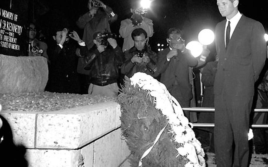 RFK inspects the memorial, which was built by Japanese base workers at Yokota.