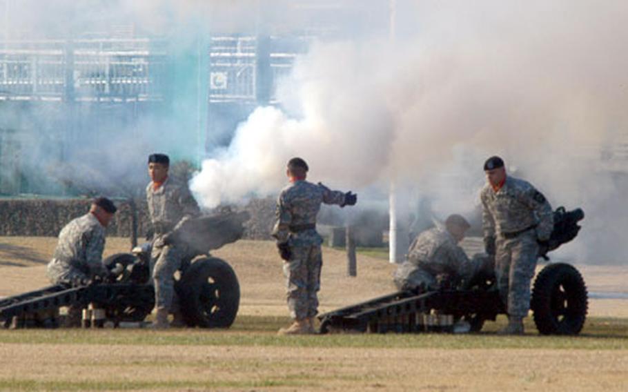 Members of the 1st Battalion, 15th Field Artillery Regiment’s salute battery fire cannons during the 2nd Infantry Division change of command ceremony Wednesday at Camp Casey.