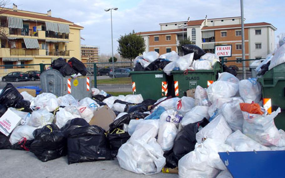 Trash piles up at a collection site in one of the housing areas on the Navy Support Site at Gricignano in Naples, Italy.