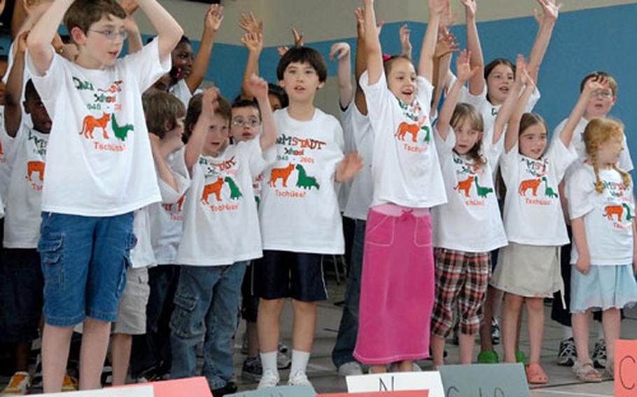 Darmstadt students sing "Children, Go Where I Send Thee", a song about moving away from Darmstadt and going to new places.