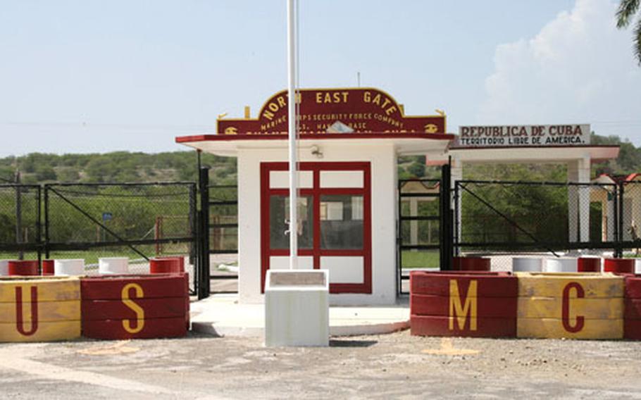 The Northeast Gate, the only gate between U.S. Naval Station Guantanamo Bay and Cuba, lets three Cubans through each day. The Cubans worked for the U.S. goverment and now transport retirement money to other Cubans who formerly worked on base.