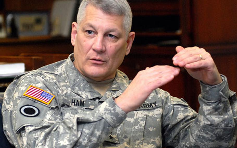 Gen. Carter Ham, United States Army Europe commander, talks about the difficulties of readjusting to life after a deployment during an interview with Stars and Stripes in his office in Heidelberg, Germany.