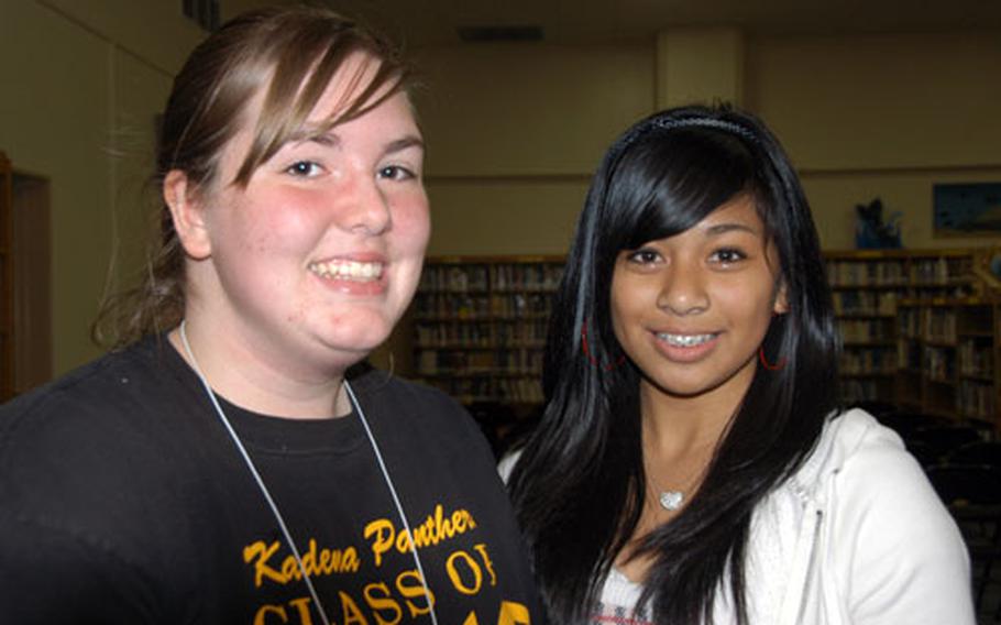 Student 2 Student mentor Amanda Donoven, left, helped Gianna Seisa navigate the Kadena campus on her first day of school earlier this month.