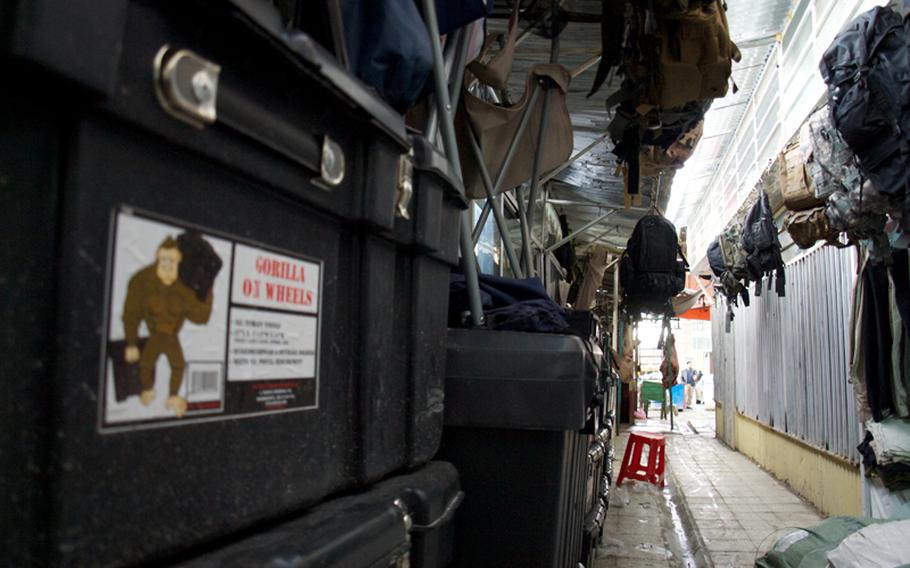 Gorilla “tough boxes,” folding chairs, backpacks and duffel bags meant for U.S. troops are for sale in Kabul’s “Bush Market,” which specializes in goods apparently stolen from American supply convoys.