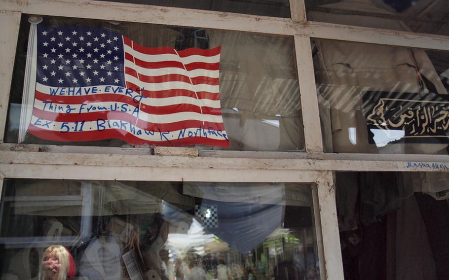 A shop in Kabul's "Bush Market" touts the fact that it carries a range of American brands, all likely stolen from coalition supply trucks.