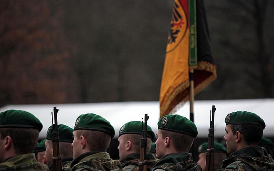 German soldiers stand in formation during a change of command Friday in which German Gen. Hans-Lothar Domröse took command of NATO's Allied Joint Forces Command Brunssum.