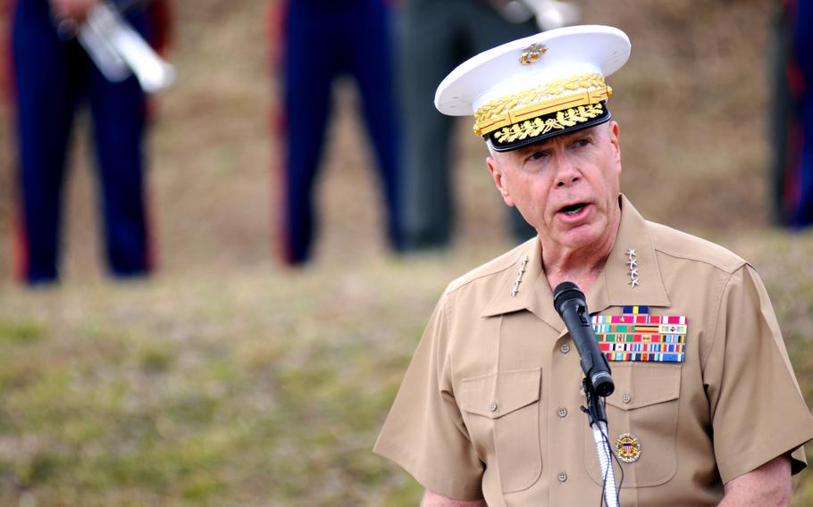 Gen. James Amos, commandant of the Marine Corps, addresses the guests of the 19th Annual Renion of Honor on Iwo Jima, Japan, March 19, 2014.