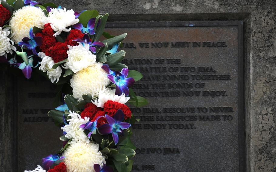 A wreath decorates a memorial site on Iwo Jima, Japan, March 19, 2014.