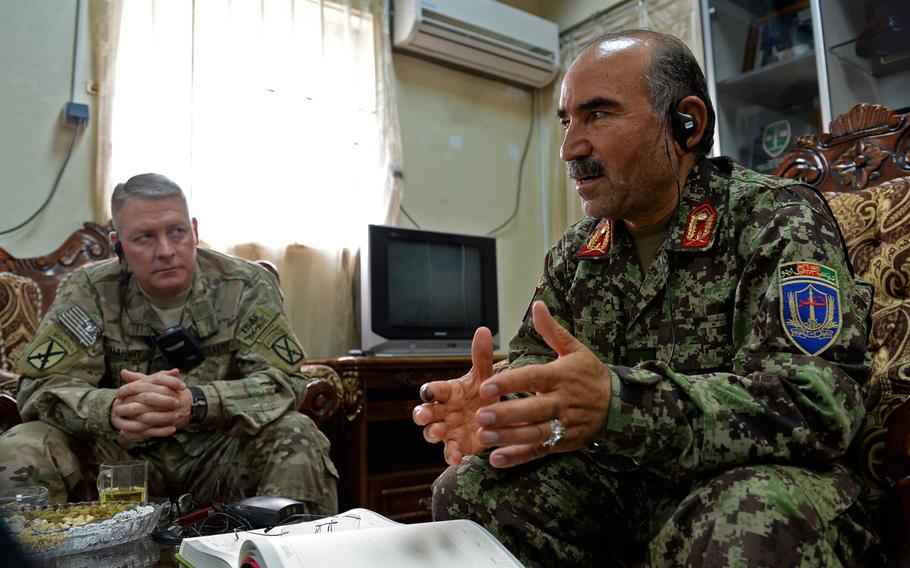 Afghan Army Maj. Gen. Muhammad Yaftali, right, and U.S. Brig. Gen. Dave Haight discuss Afghan National Security Forces' reaction to election day violence. Yaftali, whose ANA 203rd Corps covers seven provinces in southeastern Afghanistan, said his forces responded to hundreds of attacks.