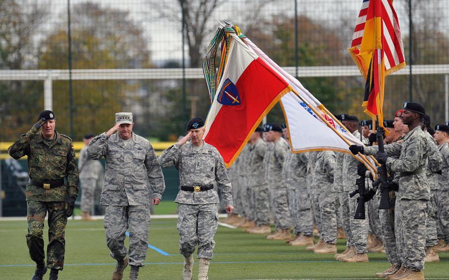 From left, German army Brig. Gen. Markus Laubenthal, U.S. Army Europe chief of staff; Air Force Gen. Philip Breedlove, commander of U.S. European Command; and outgoing USAREUR commander Lt. Gen. Donald Campbell Jr. inspect the troops at the USAREUR change-of-command ceremony in Wiesbaden, Germany, Wednesday, Nov. 5, 2014. Lt. Gen. Frederick ''Ben'' Hodges became the new USAREUR commander at the ceremony.