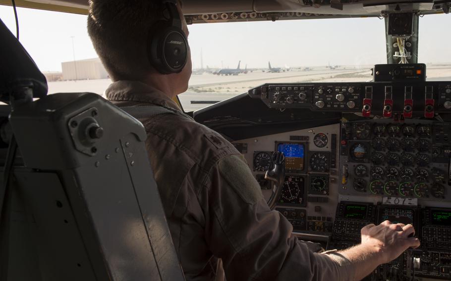 KC-135 Stratotanker aircraft commander and pilot Maj. Joe drives the aircraft during taxiing prior to taking off from Al Udeid Air Base in Qatar for a refueling mission in support of the air campaign against the Islamic State group in Iraq and Syria on March 24, 2016. Crewmembers could not be identified by their full names for security reasons.