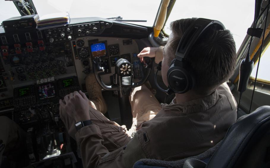 KC-135 Stratotanker co-pilot 1st Lt. Scott and the crew fly back to Al Udeid Air Base in Qatar on March 24, 2016, after refueling F-15 and F-16 fighters supporting the air campaign against Islamic State militants in Iraq and Syria. Crewmembers could not be identified by their full names for security reasons.