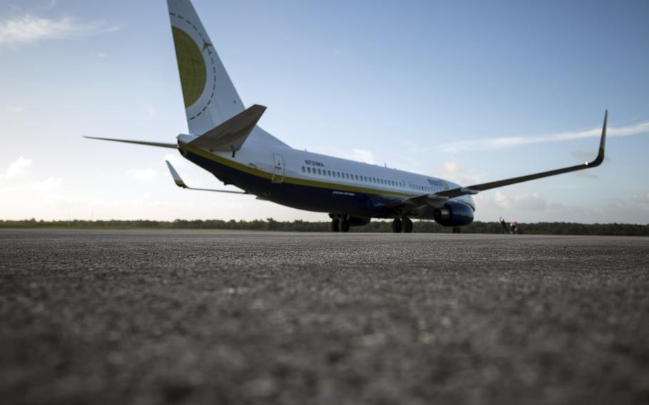 A Boeing 737 carrying about 100 U.S. Marines lands Nov. 6, 2013, at Tinian's international airport.