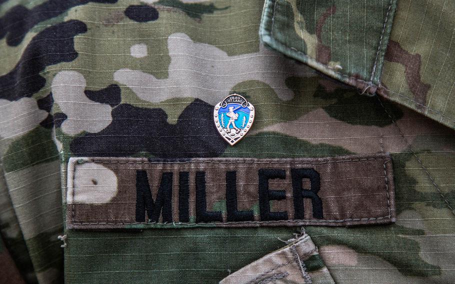 The Norwegian Marsjmerket, or Foot March badge, is displayed on the Kapaun Memorial Ruck March's fastest finisher, 1st Lt. Raymond Miller, at Camp Humphreys, South Korea, Thursday, Nov. 2, 2017.