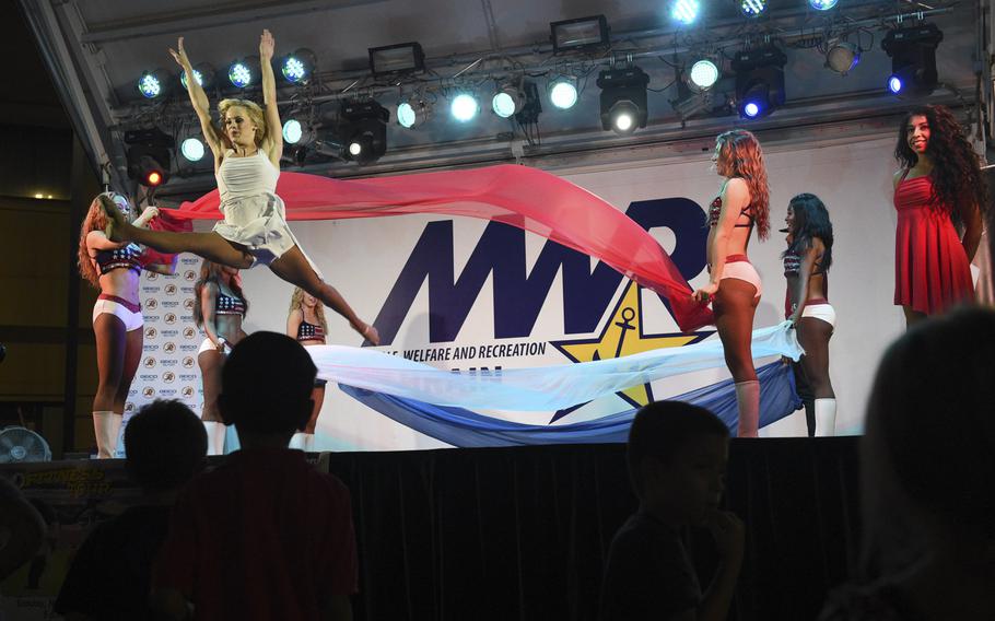 Washington Redskins cheerleaders perform for a crowd of servicemembers and their families on Tuesday, Nov. 7, 2017, in Bahrain. The cheerleaders were joined by former NFL players in a 10-day tour of Southwest Asia.