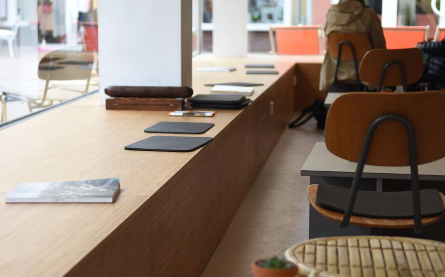 The interior of Carla Ohio Coffee and Things is sparse with an eye towards minimalism. Natural lighting from the cafe's big windows help brighten the inside.