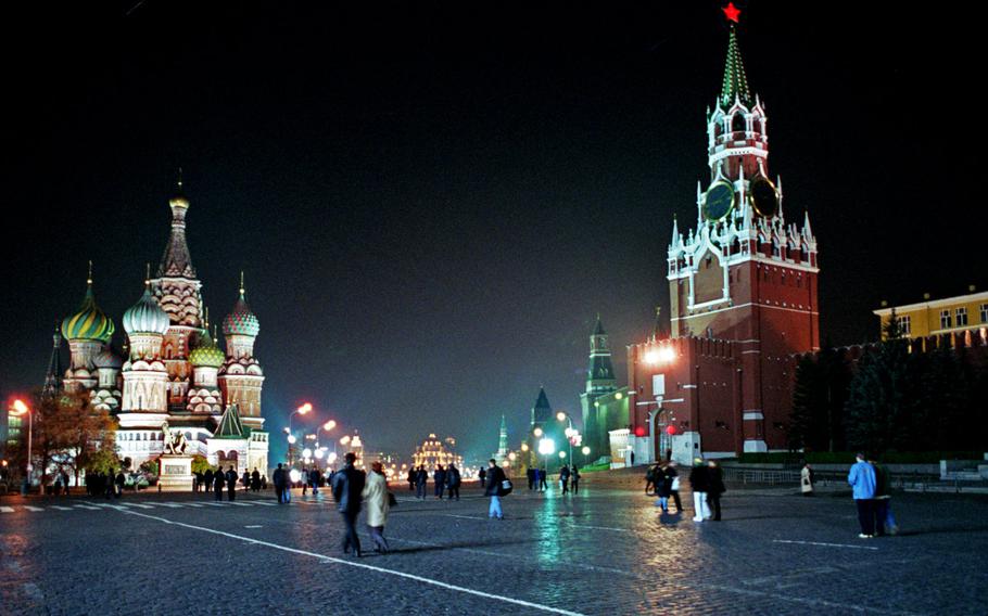 Tourists and Muscovites stroll across Red Square, with St. Basil's Cathedral on the left and the Kremlin with the Spassky tower at right. U.S. European Command confirmed that a directive still stands that advises military personnel to refrain from all non-business travel to Russia unless it is for a family emergency.