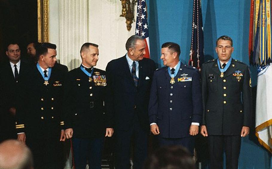 President Lyndon Johnson poses with four U.S. servicemen, to whom he presented the Medal of Honor Jan. 16, 1969, for heroism in Vietnam. From left to right: Navy Lt. Clyde E. Lassen, Ft. Myers, Fla.; Marine Maj. Stephen W. Pless, Newman, Ga.; Air Force Lt. Col. Joe M. Jackson, Newman, Ga.; and Army Staff Sgt. Drew D. Dix, Pueblo, Colo. Jackson died over the weekend at the age of 95.