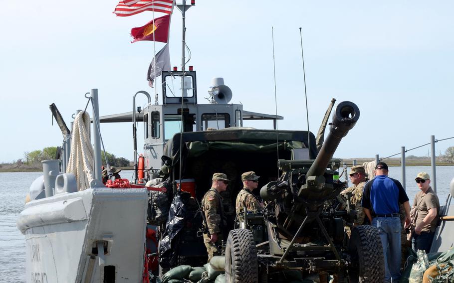 Virginia National Guard soldiers assigned to the Norfolk-based 1st Battalion, 111th Field Artillery Regiment, 116th Infantry Brigade Combat Team conduct waterborne artillery live-fire exercises during Operation Gator April 24-25, 2019, at Camp Lejeune, N.C.