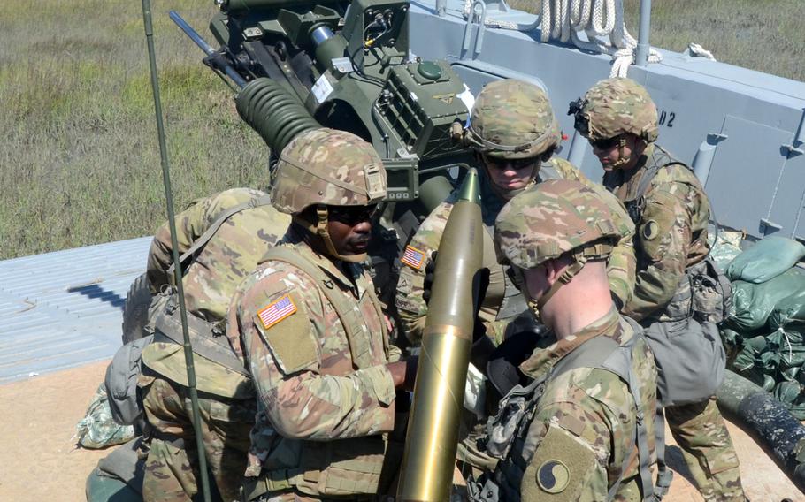 Virginia National Guard soldiers assigned to the Norfolk-based 1st Battalion, 111th Field Artillery Regiment, 116th Infantry Brigade Combat Team conduct waterborne artillery live-fire exercises during Operation Gator April 24-25, 2019, at Camp Lejeune, N.C.