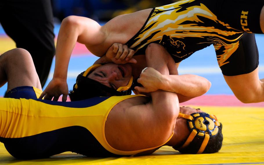 Patch wrestler Chris Carlisle wrestles Heidelberg's Marquez Ensey during a 126-pound weight class round robin match at the Eastern Sectionals hosted by Patc. Carlisle won the match and took second place in his weight class.