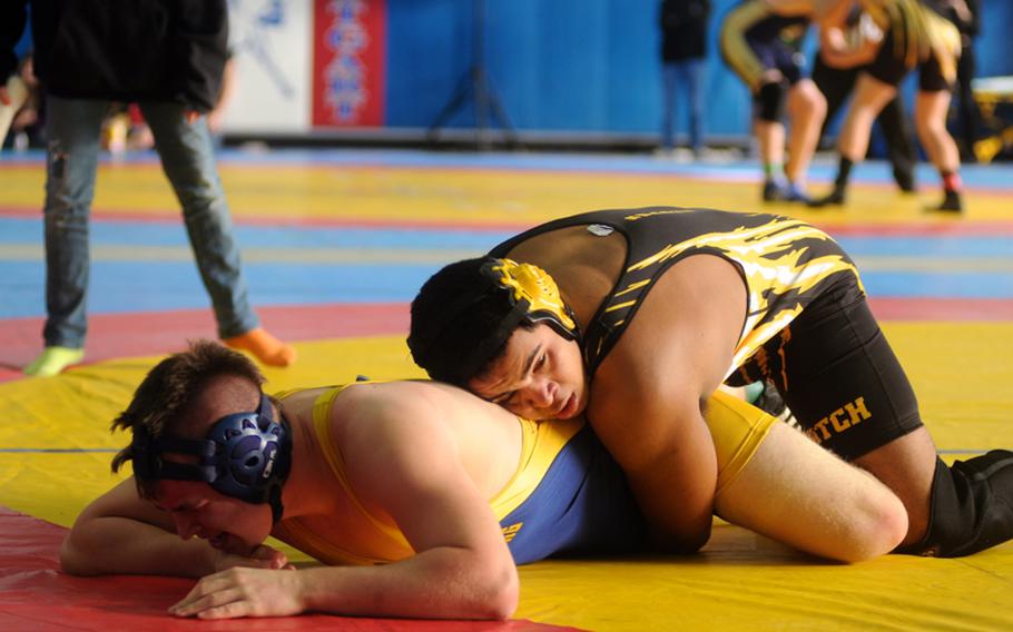 Patch wrestler Albert Suarez wrestles Heidelberg's Alex Grant during a 195-pound weight class round robin match at the Eastern Sectionals hosted by Patch. Grant won the match and took first place in his weight class. Suarez took second. 