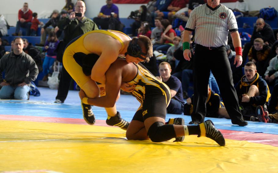 Patch wrestler Albert Suarez wrestles Heidelberg's Alex Grant during a 195-pound weight class round robin match at the Eastern Sectionals hosted by Patch. Grant won the match and took first place in his weight class. Suarez took second. 