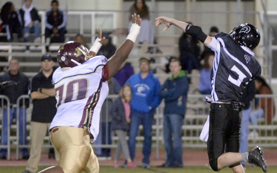 Zama's Tim Matelski airs it out over Matthew C. Perry's R.J.. Smith.