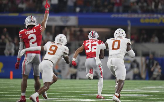 College football teams compete in a bowl game in Arlington, Texas.