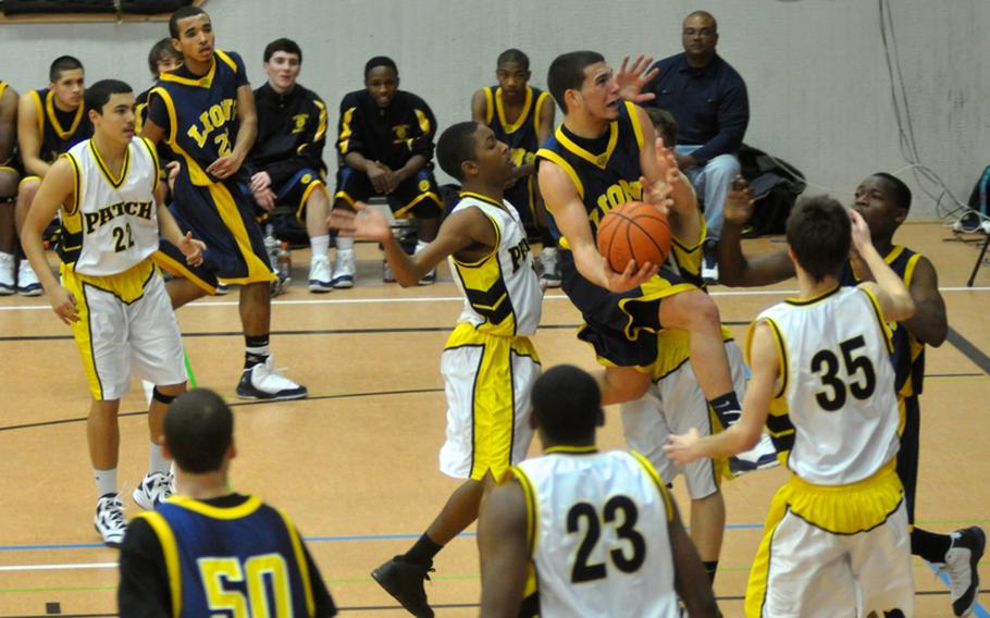 Heidelberg's Sam Rosario attempts a layup during Tuesday night's game between the Lions and Patch. Heidelberg won the game, 52-37, staying unbeaten and clinching the Region III title. 