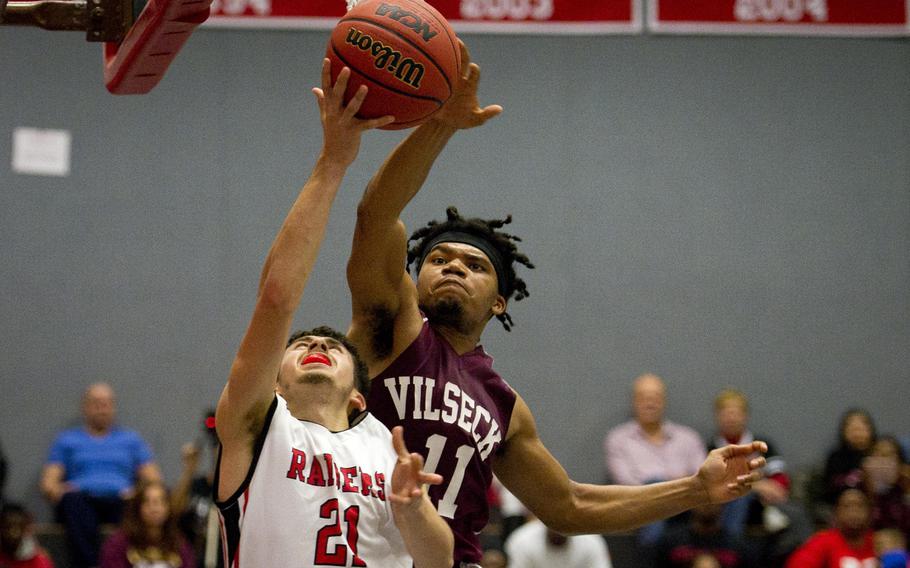 Vilseck's Terron Sizemore, right, blocks a shot by Kaiserslautern's Eril Santiago at Vogelweh, Germany, on Friday, Dec. 1, 2017. Vilseck lost 83-44.
