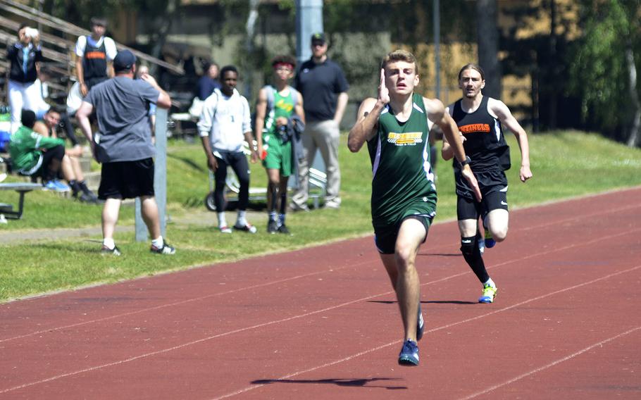 Alconbury's Caleb Erickson finishes strong in the 400-meter dash event during a high school track meet at RAF Lakenheath, England, Saturday, May 19, 2018. Erickson clocked in 54.26 seconds for first place.
