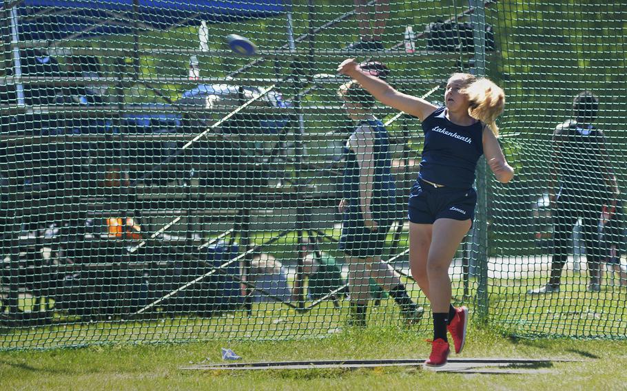 Lakenheath's Aubri Butler throws the discus 95 feet, 5.5 inches for first place during a high school track meet at RAF Lakenheath, England, Saturday, May 19, 2018.